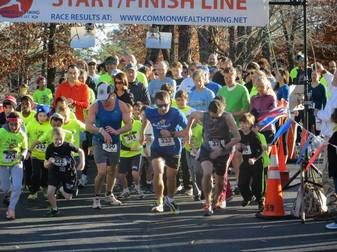 Runners take off from the start line during a Virginia race